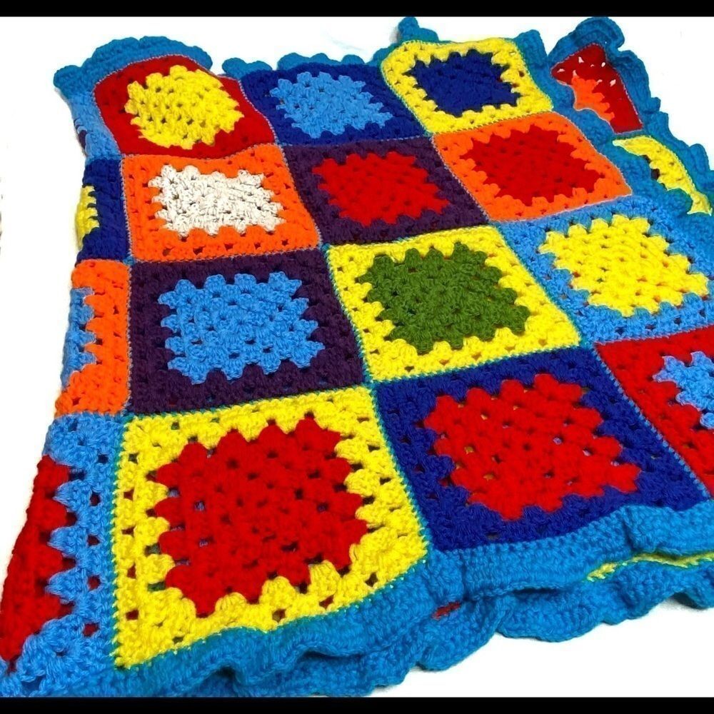 Hand crocheted bright multi colored Afghan size 56” X 31”